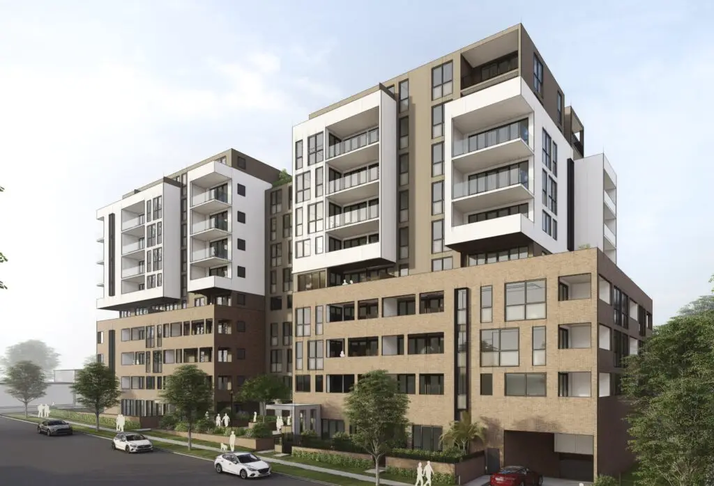 A digital rendering of a ten-storey mixed-use apartment building with a modern design, featuring balconies, brick and white finishes, and green landscaping in Ingleburn, NSW.