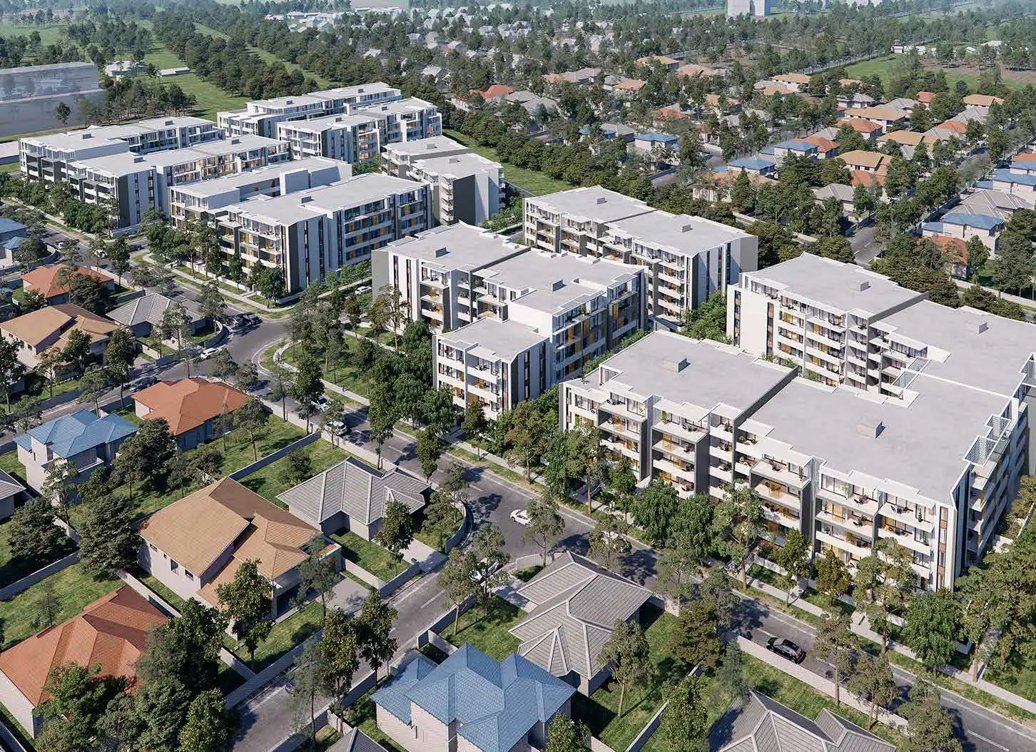 Aerial view of proposed six residential buildings at Tallawong surrounded by greenery and existing suburban homes. The development includes mid-rise apartments with landscaped communal areas and is part of a mixed-use project.