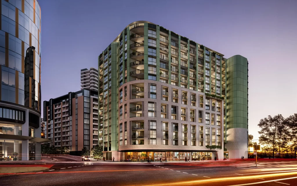 ender of the Westmead Innovation Quarter Stage 3 development featuring a modern 15-storey building with green façade accents, retail spaces at ground level, and residential apartments above, set against a twilight cityscape.