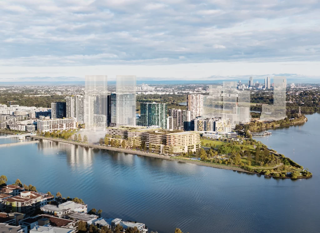 Aerial rendering of the proposed Wentworth Point mixed-use development, showing a waterfront precinct with mid-rise residential buildings, landscaped public spaces, and a foreshore promenade. Transparent high-rise towers in the background indicate potential future developments. The image overlooks Homebush Bay, with Sydney’s skyline visible in the distance.