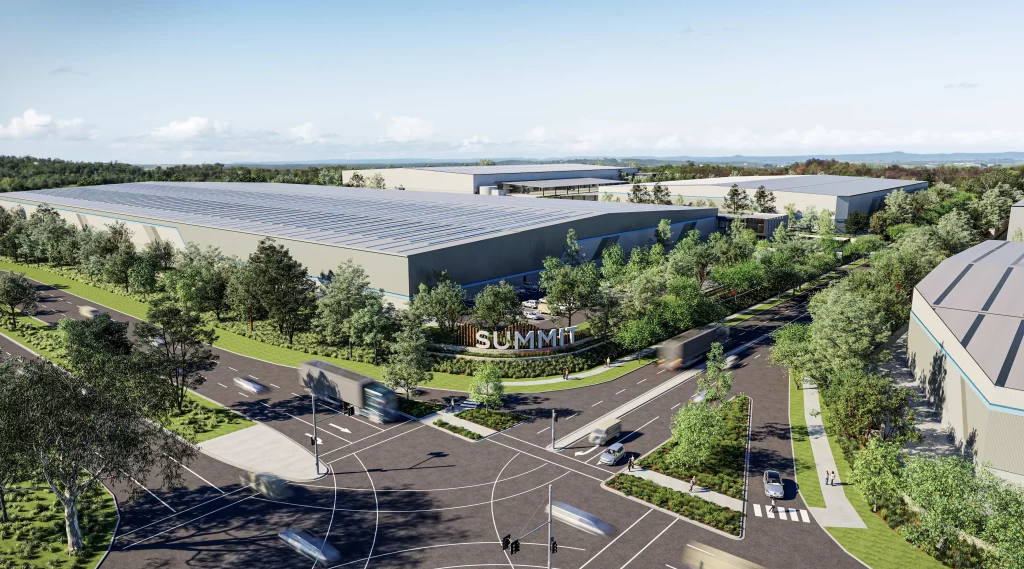 Rendering of the Summit at Kemps Creek industrial development featuring modern warehouse buildings, a landscaped entrance with a 'Summit' sign, and a well-planned road network with surrounding greenery.