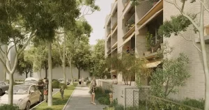 A tree-lined residential street with a modern low-rise apartment building featuring balconies with greenery. People are walking along the footpath, engaging in daily activities, and interacting with their surroundings. The scene highlights a pedestrian-friendly urban environment with ample green space.