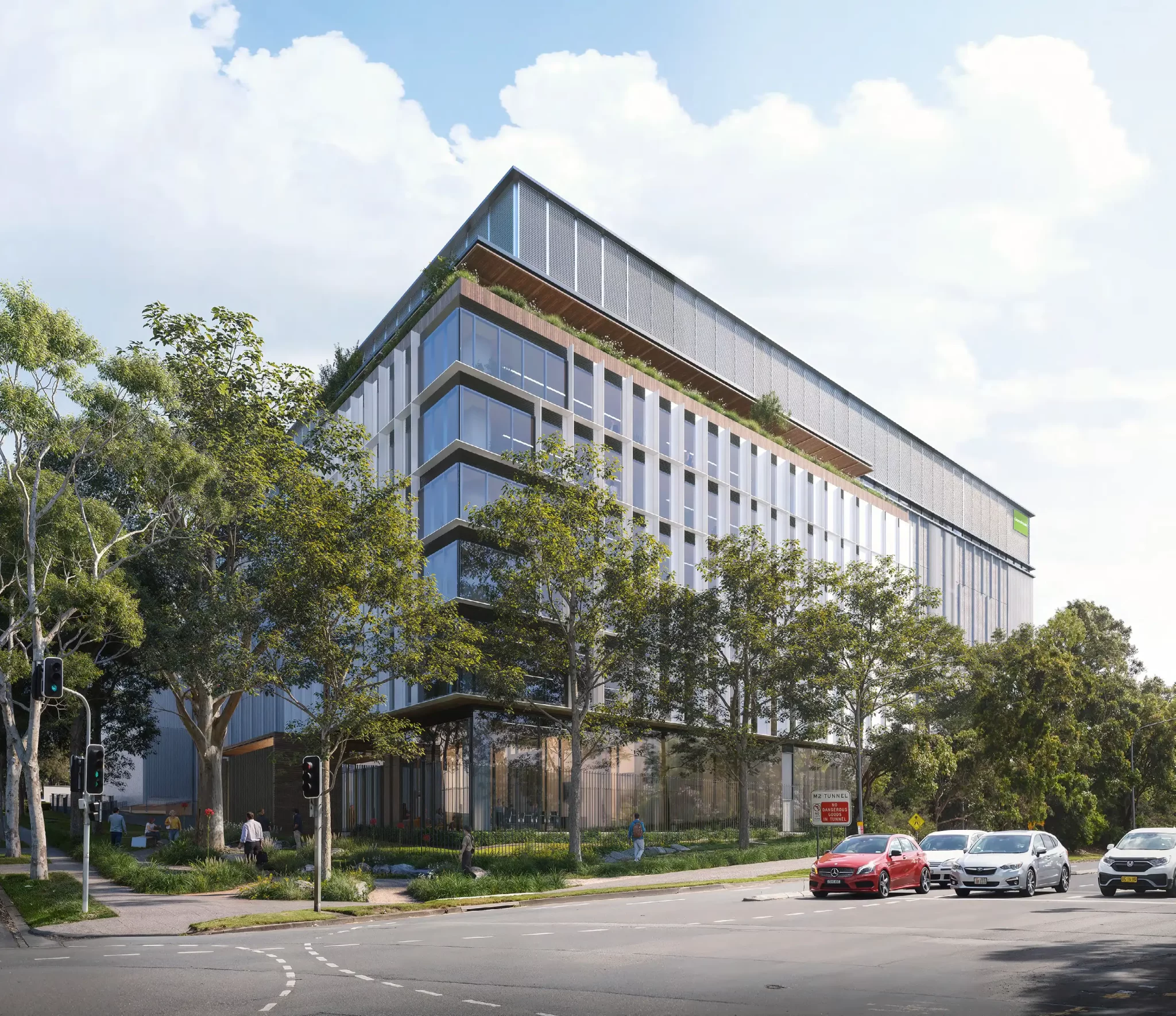 Architectural rendering of a proposed five-storey data centre at 4–10 Talavera Road, Macquarie Park, showing a modern glass-and-metal façade surrounded by landscaping and trees, with cars waiting at a traffic light in the foreground.