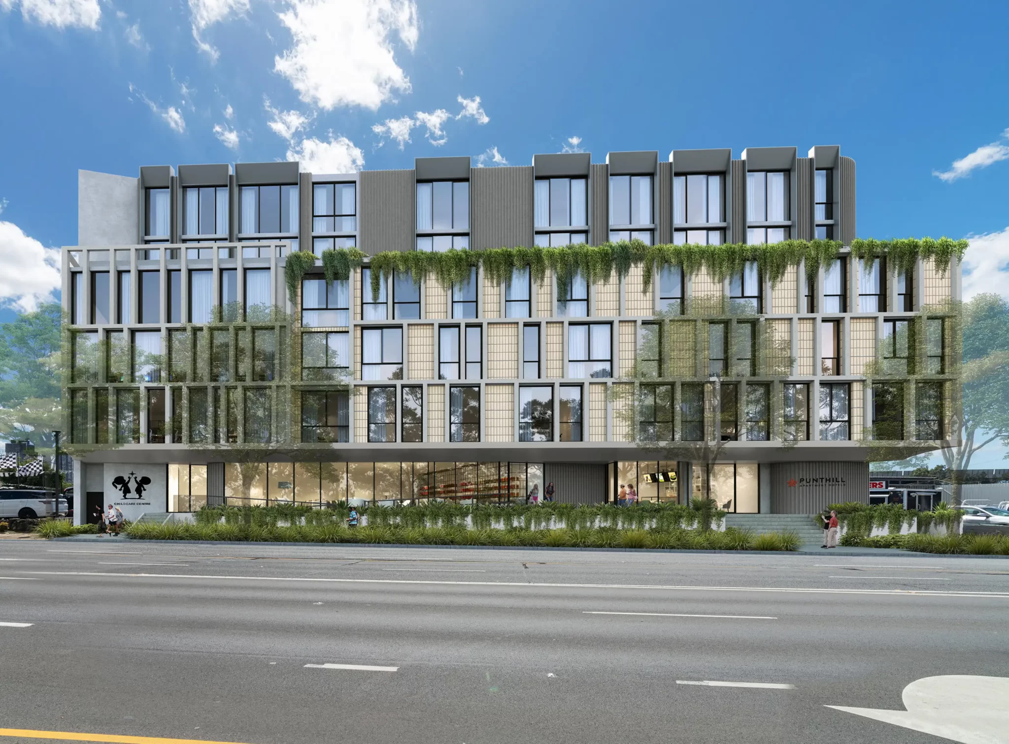 Street-facing view of a modern mixed-use development with green façade and commercial ground floor at 99 Parramatta Road, Granville.