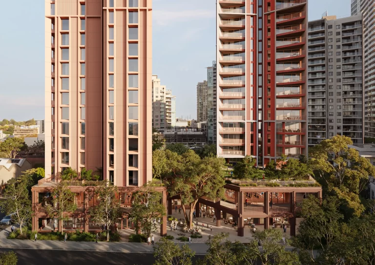 Render of a proposed twin-tower development in Chatswood, showing two high-rise residential buildings with a landscaped podium and active street-level frontage.