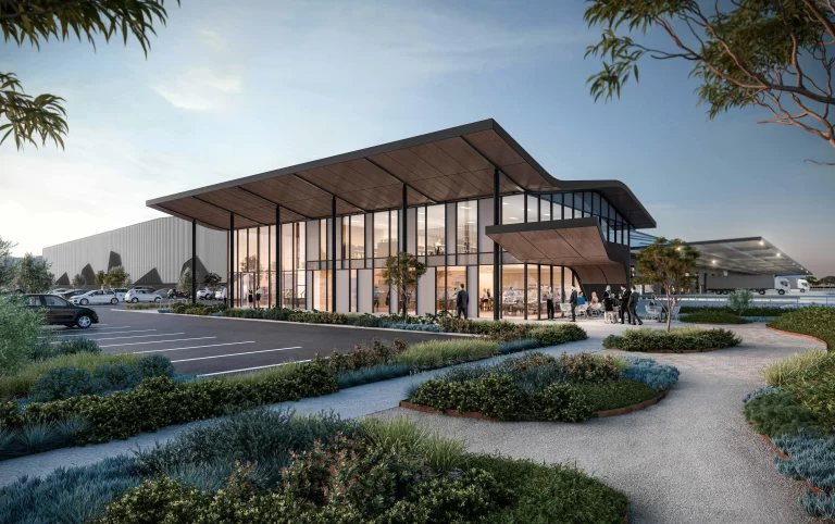 Render of a modern warehouse and office building with a curved roof, glass façade, landscaped forecourt, and adjacent truck loading area.