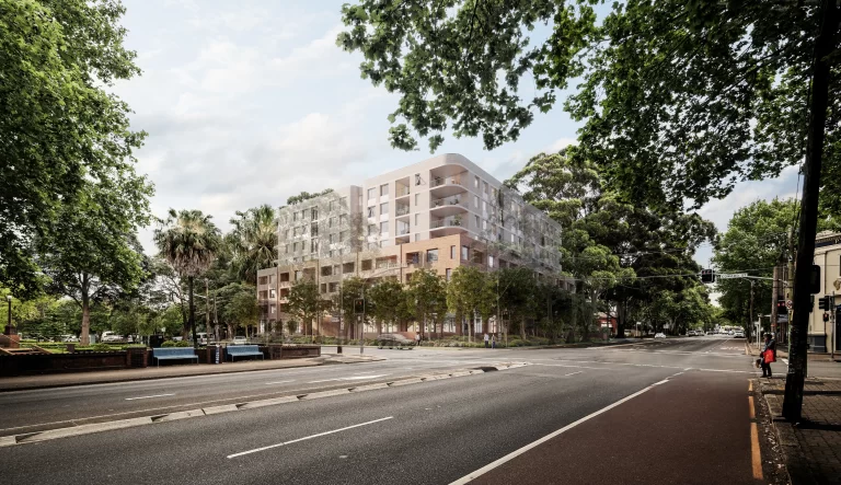 Photomontage of an eight-storey affordable housing development by Homes NSW at the corner of Botany Road and Coward Street, Mascot, surrounded by mature trees and open streetscape.