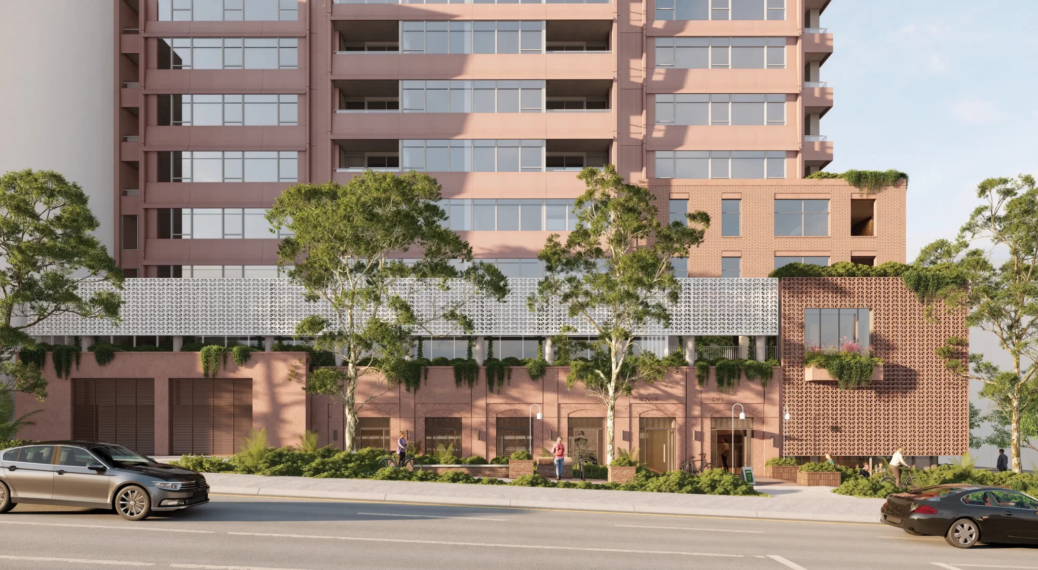 Street-level view of a proposed Build-to-Rent residential tower in Chatswood, featuring a layered red-brick and white breeze-block façade with integrated greenery and pedestrians walking along the footpath.