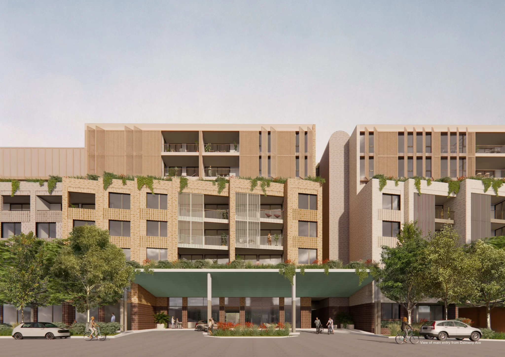 Render of the Rosebery Seniors Living Development showing the main entry from Dalmeny Avenue, featuring mid-rise buildings with brick and timber façades, green roof plantings, and a porte-cochere drop-off area.