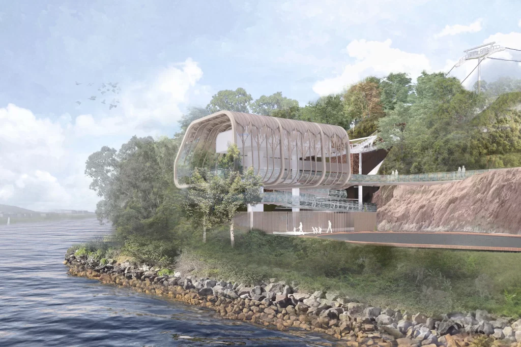 Architectural rendering of Taronga Zoo’s new lower cable car station on the harbour foreshore, featuring a curved, organic roof structure nestled into the bushland.
