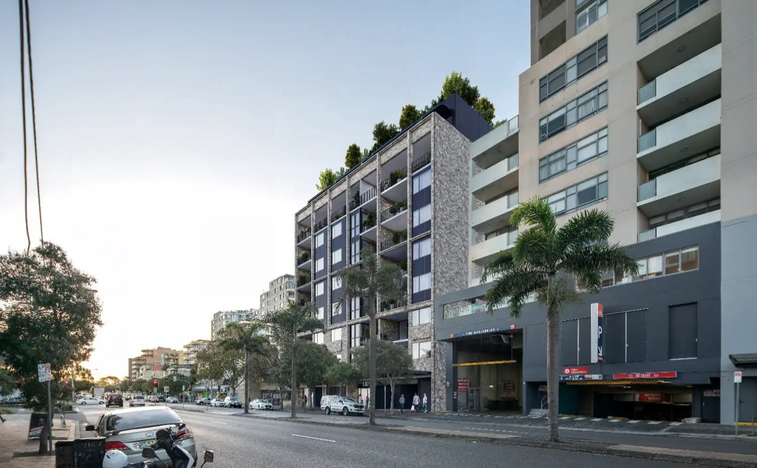 Street-level render showing the proposed nine-storey mixed-use development at 138 Maroubra Road, viewed from the intersection with Anzac Parade.