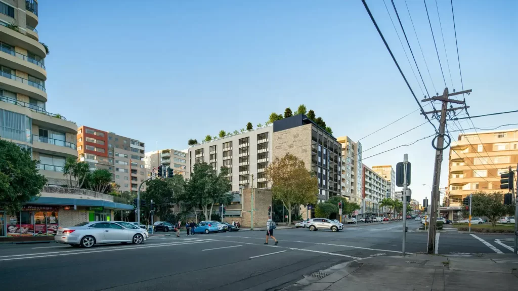 Render of the proposed development at 138 Maroubra Road, showing the northern façade and retail frontage facing Maroubra Road.